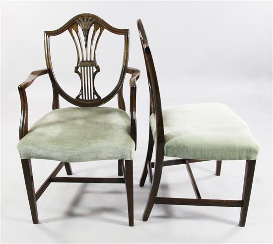 A set of ten late 19th century Hepplewhite style mahogany dining chairs,